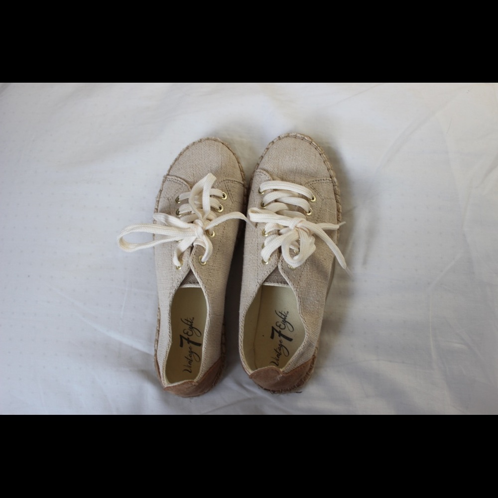 cream/tan lace up shoes